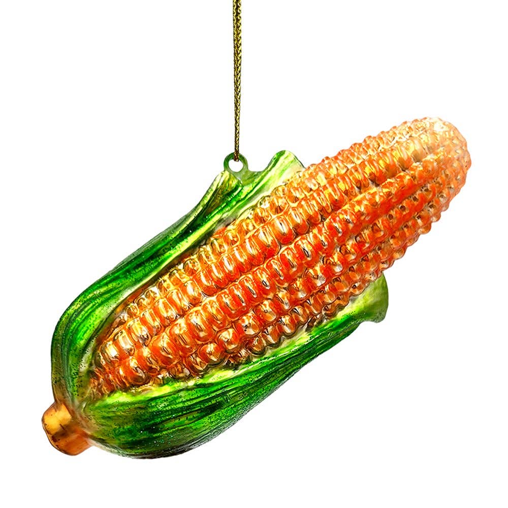 Corn on the cob ornament with green husk on a white background