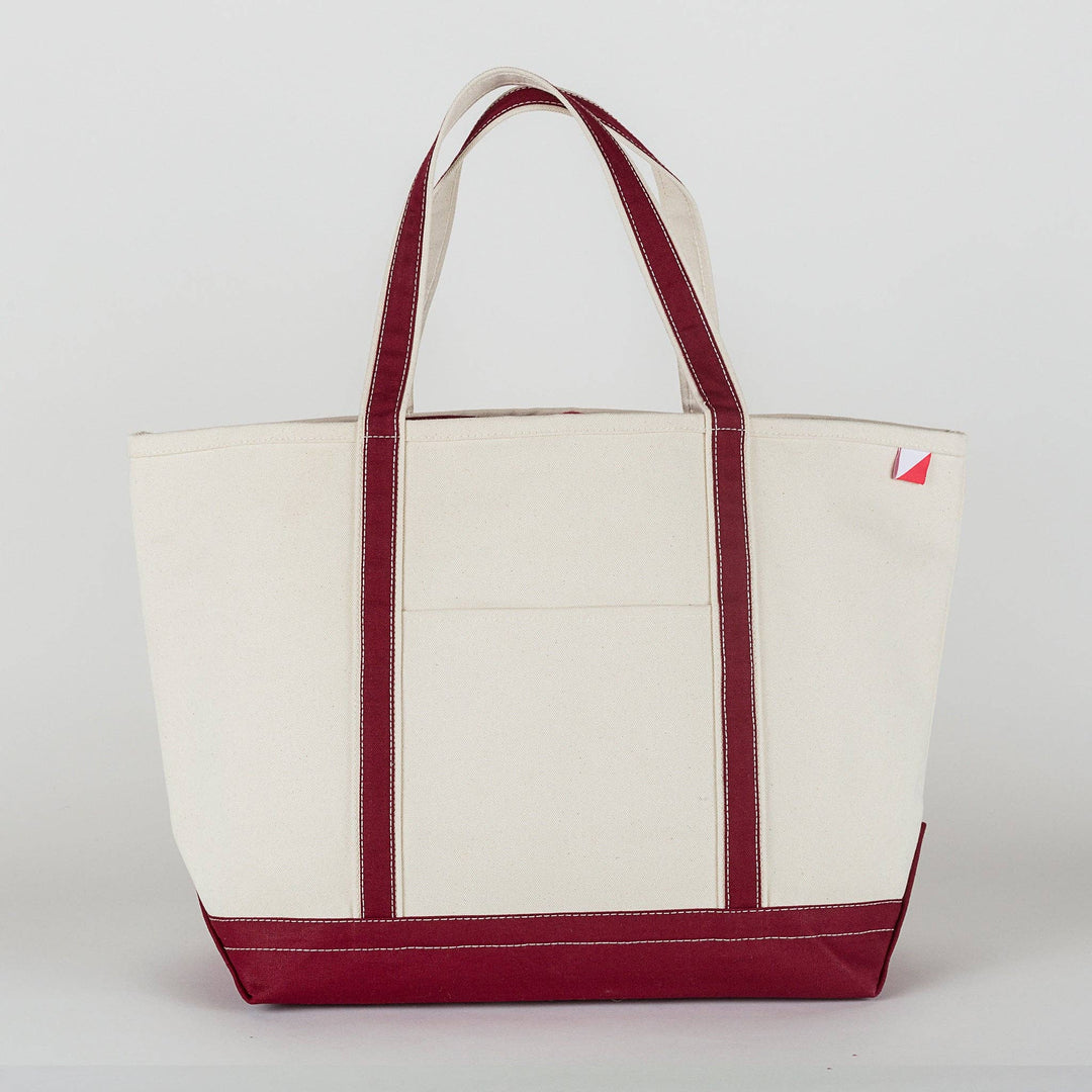 Canvas tote bag with maroon handles