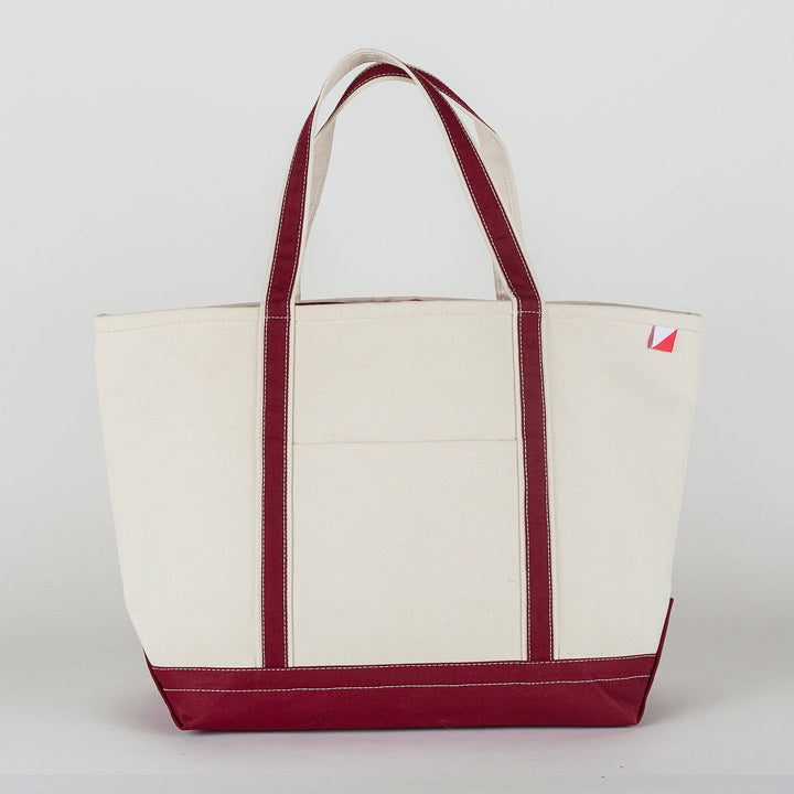 Canvas tote bag with maroon handles