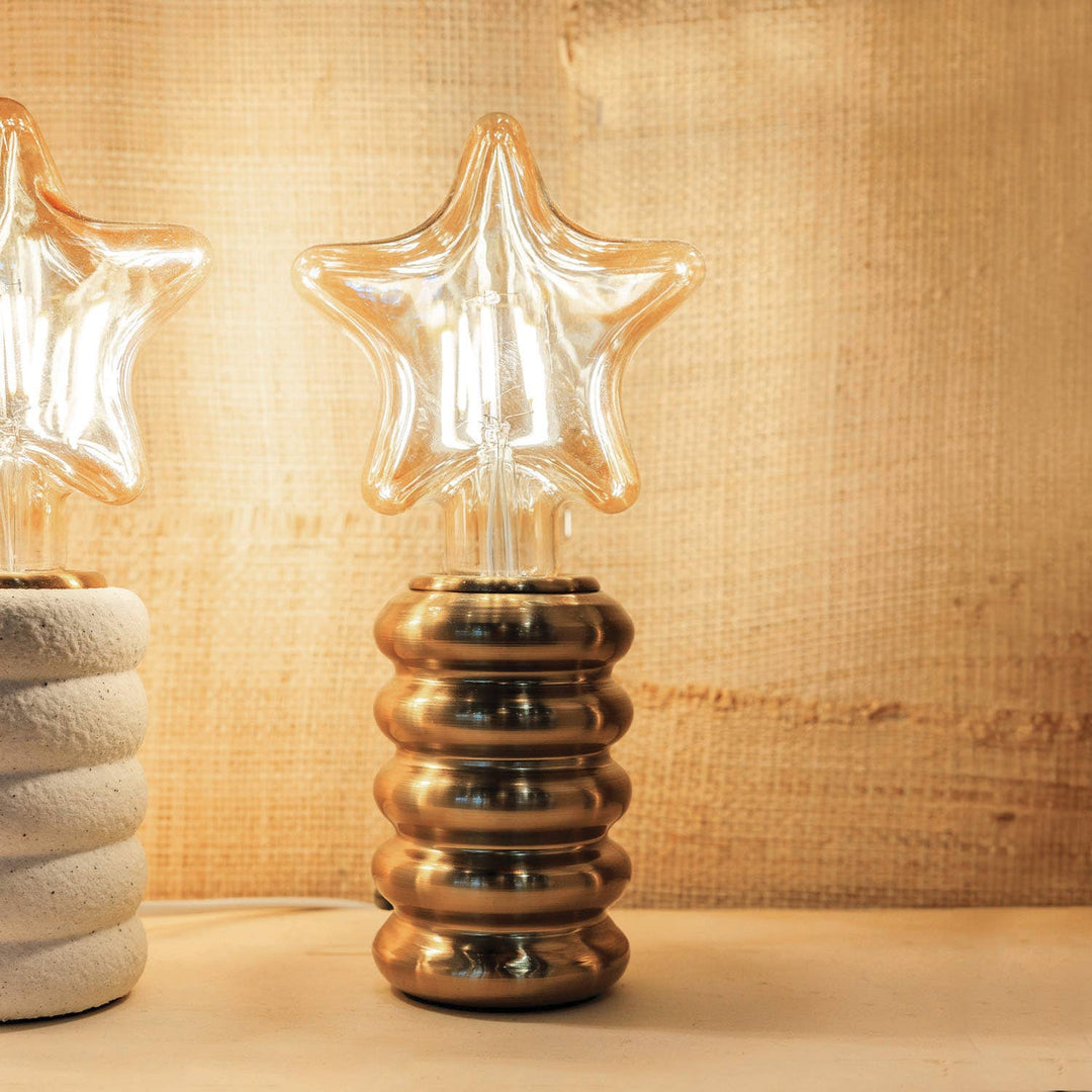 Star-shaped lightbulb in a modern lamp