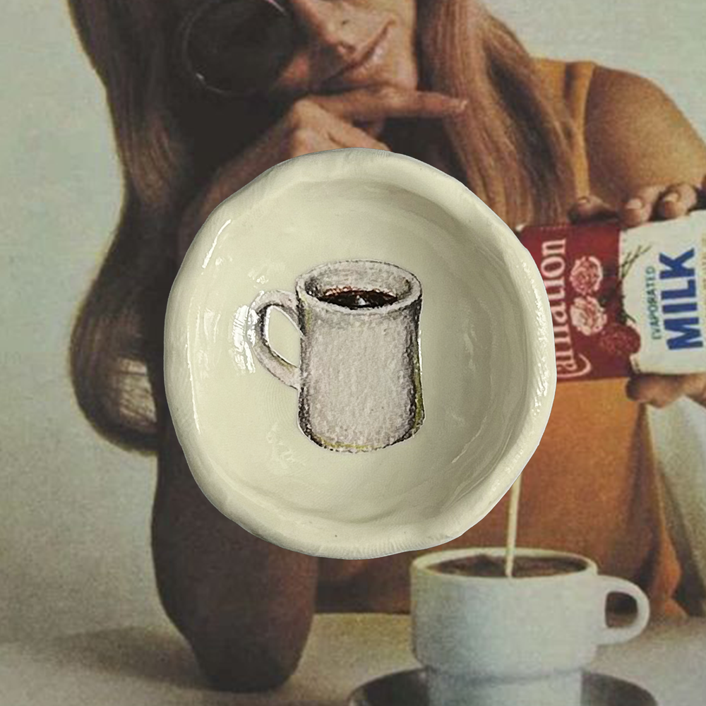 Trinket dish with a retro diner style coffee mug illustration on an old advertisement for Carnation Evaporated Milk