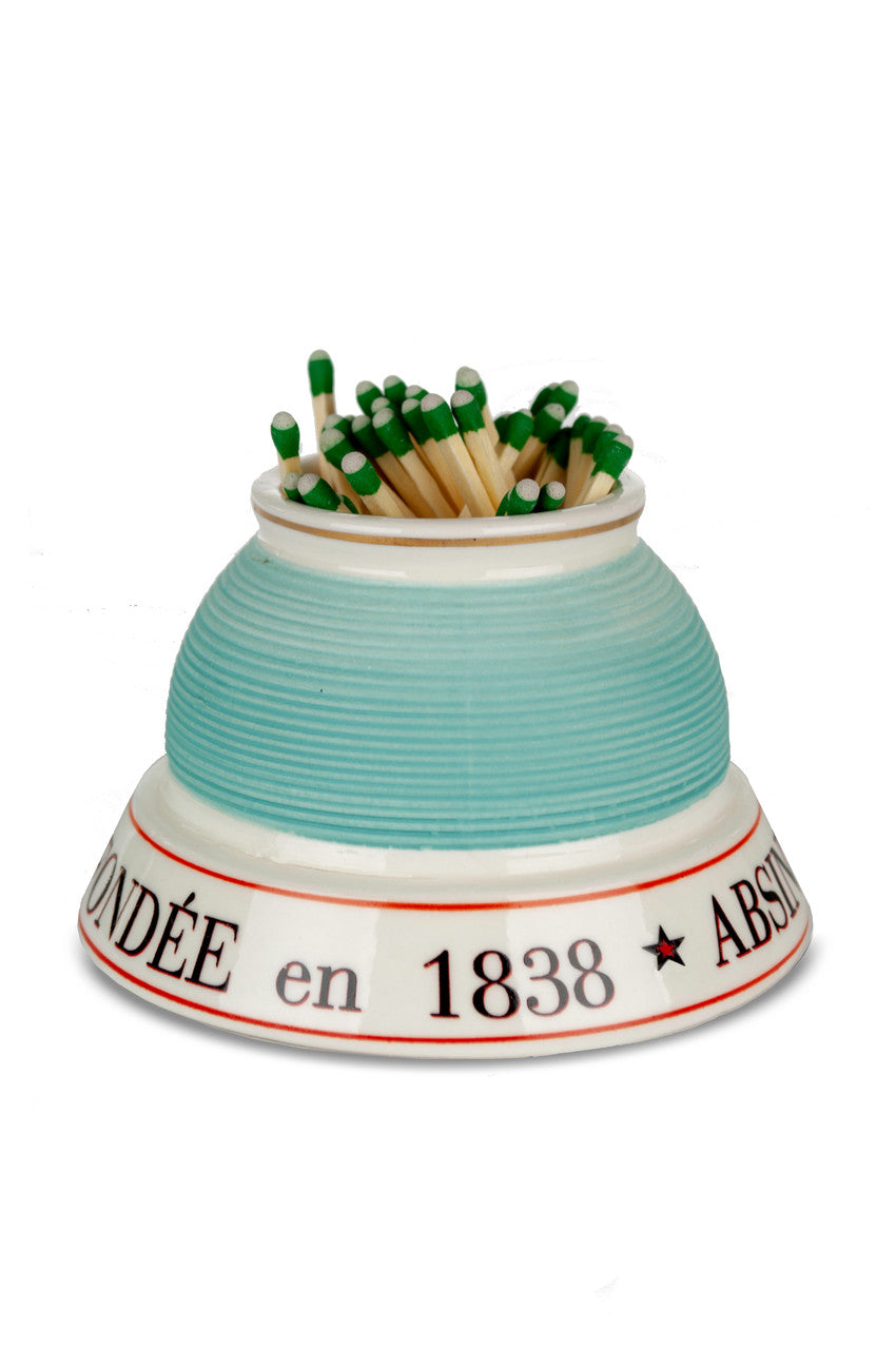 Ceramic match striker with matches on a white background