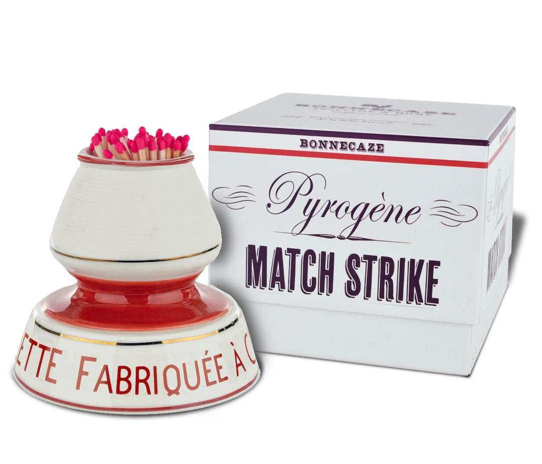 Match striker with matches and packaging labeled 'Pyrogène Match Strike' on a white background