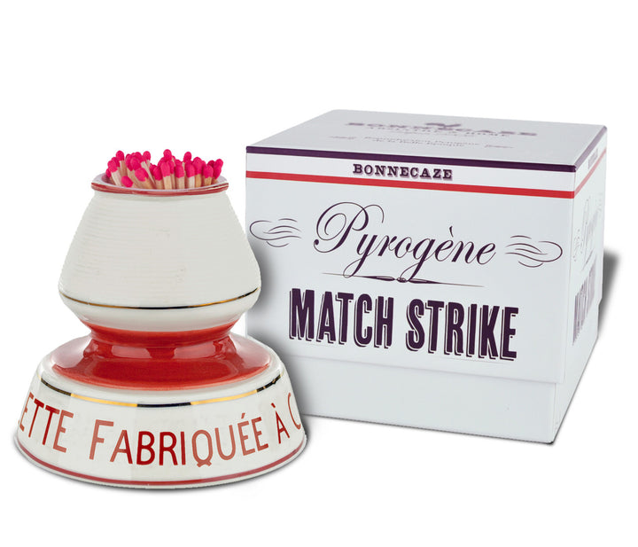 Match striker with matches and packaging labeled 'Pyrogène Match Strike' on a white background