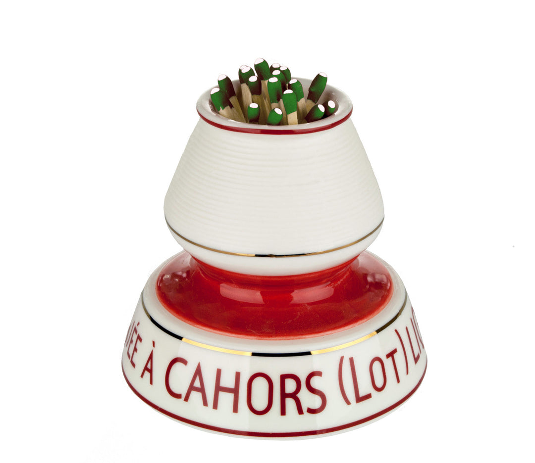Decorative item with red and white design and text on a white background