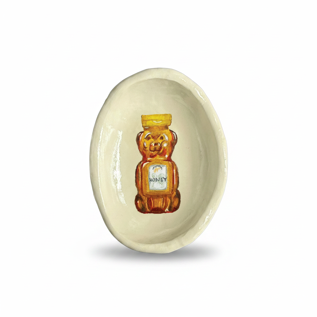 Trinket bowl with illustration of the plastic honey bear dispenser packaging