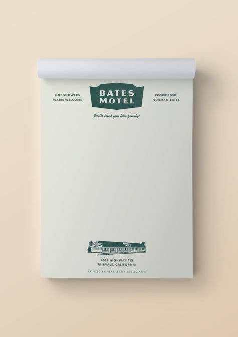 Notepad with Bates Motel branding on a beige background