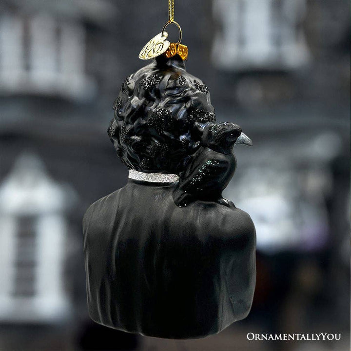 Decorative ornament of a man with a bird on his shoulder against a blurred background, shows glitter on the ornament